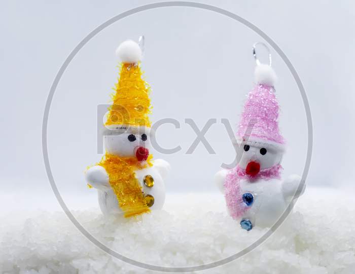 Merry Christmas And Happy New Year Greeting Card .Two Cheerful Snowman Standing In Winter Christmas Landscape