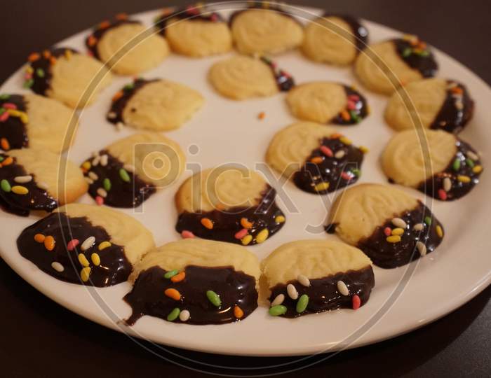 Colorful Christmas Butter Cookies with Chocolate garnishing