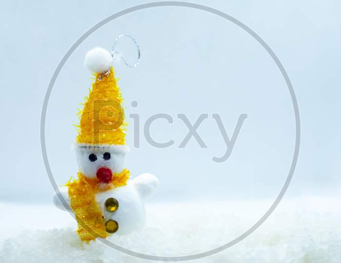 Happy Snowman Standing In Winter Christmas Landscape. Merry Christmas And Happy New Year Greeting Card. Copy Space.