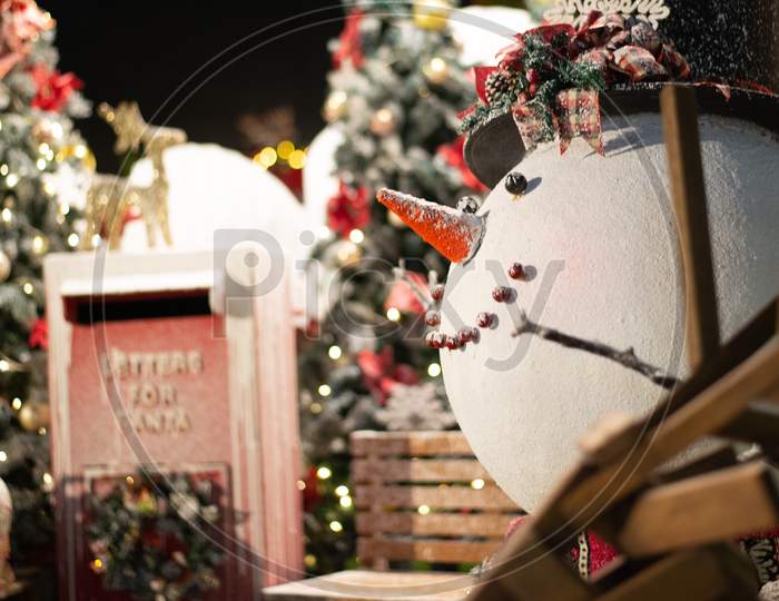 Close Up Snowman With Christmas Background