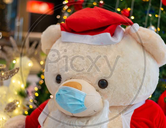 Bear With Mask With Christmas Cloth