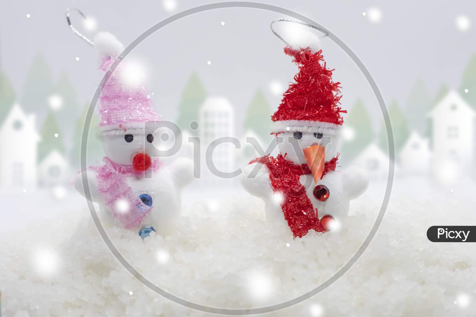 Merry Christmas And Happy New Year Greeting Card .Two Cheerful Snowman Standing In Winter Christmas Landscape.