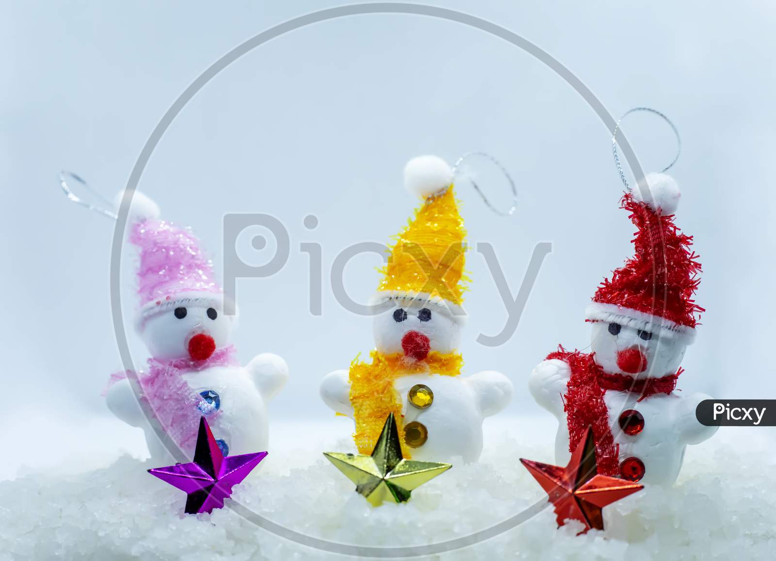 Merry Christmas And Happy New Year Greeting Card With Copy-Space.Many Snowmen Standing In Winter Christmas Landscape.