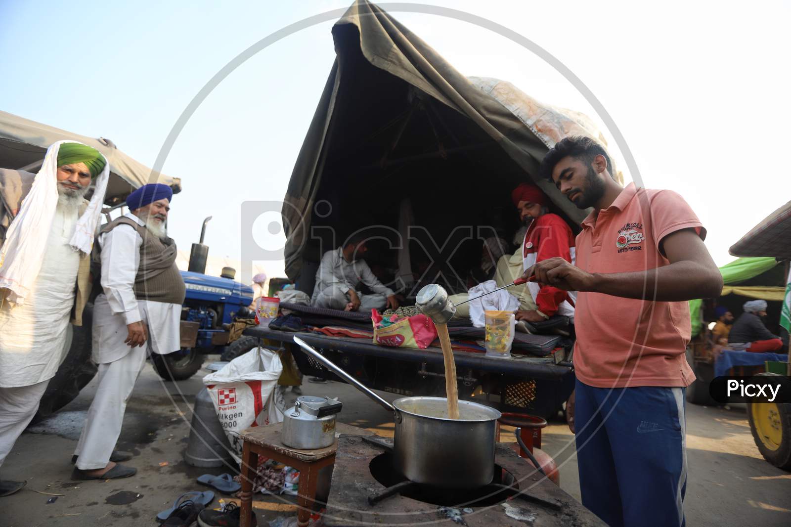 Farmers preparing food at Singhu Border during a protest against new farm laws in New Delhi, India.
