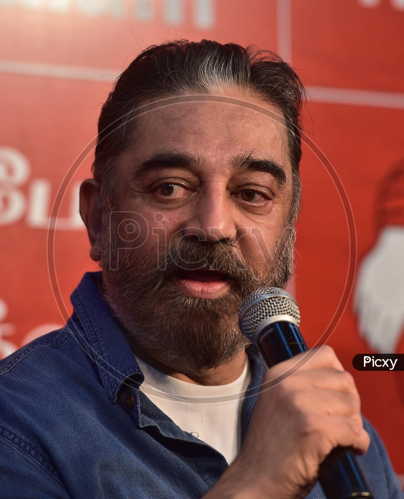 Actor-turned-politician and Makkal Needhi Maiam (MNM) chief Kamal Haasan interacts with the media after former IAS officer Santosh Babu joined his party, in Chennai, Tuesday