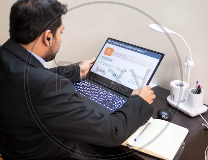 A Young India Business Man Working From Home