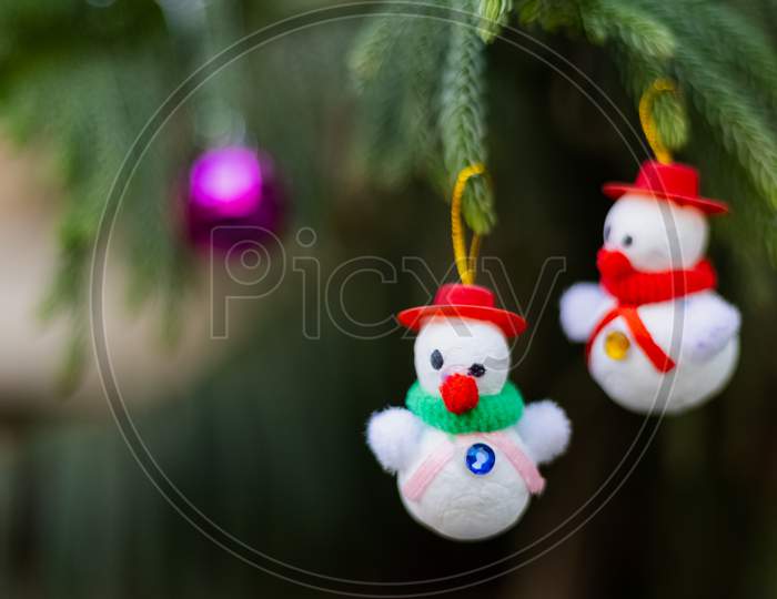 Christmas celebration snowman on Pine tree