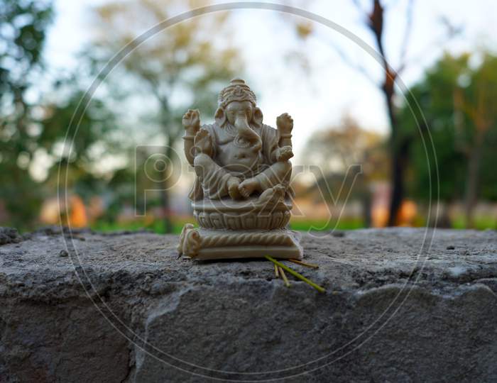White Beautiful Figurine Of Ganesha, Hindu God Of Wisdom, Knowledge. New Decoration Of Ganesha Idol For Christmas Festival.