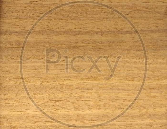 Natural Golden Teak Quarter Cut Wood Texture Background. Golden Teak Quarter Cut Veneer Surface For Interior And Exterior Manufacturers Use.