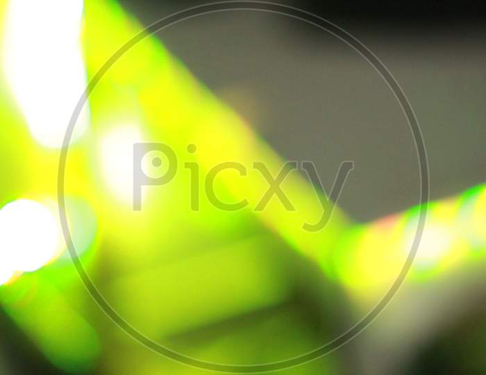 The close up of a green and yellow background.