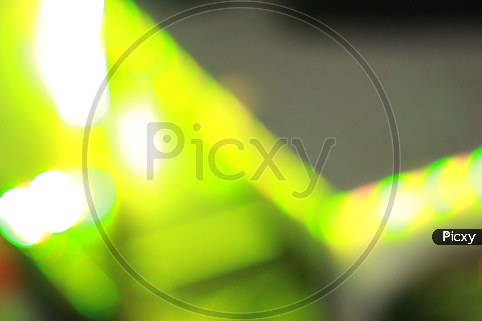 The close up of a green and yellow background.