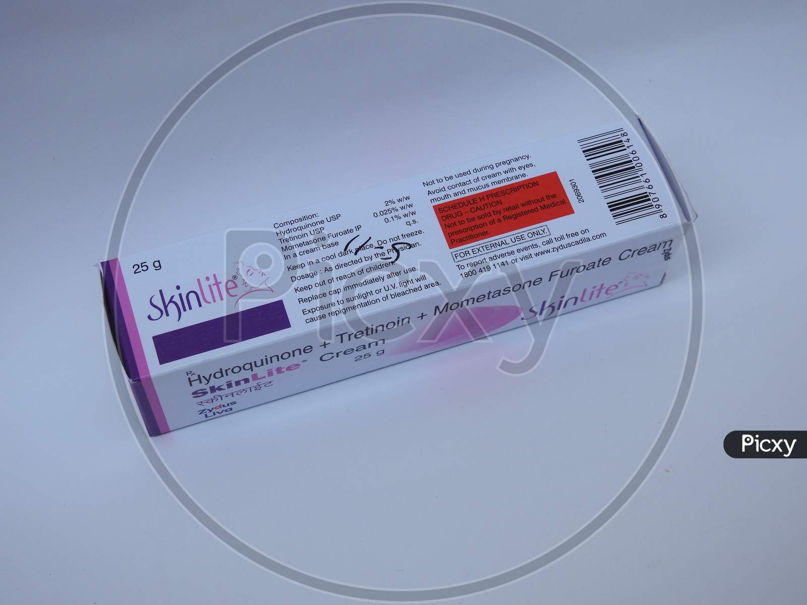 Closeup of SkinLite Cream 25g Pack and Tube isolated on White Background
