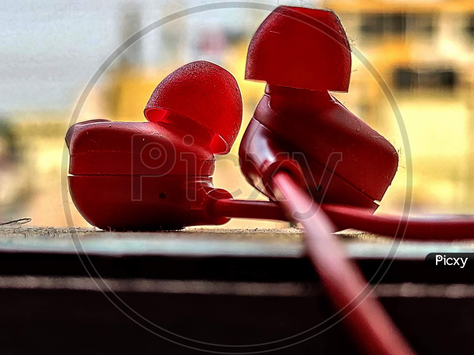 Picture Of Red Color Wireless Earphone Or Ear Buds