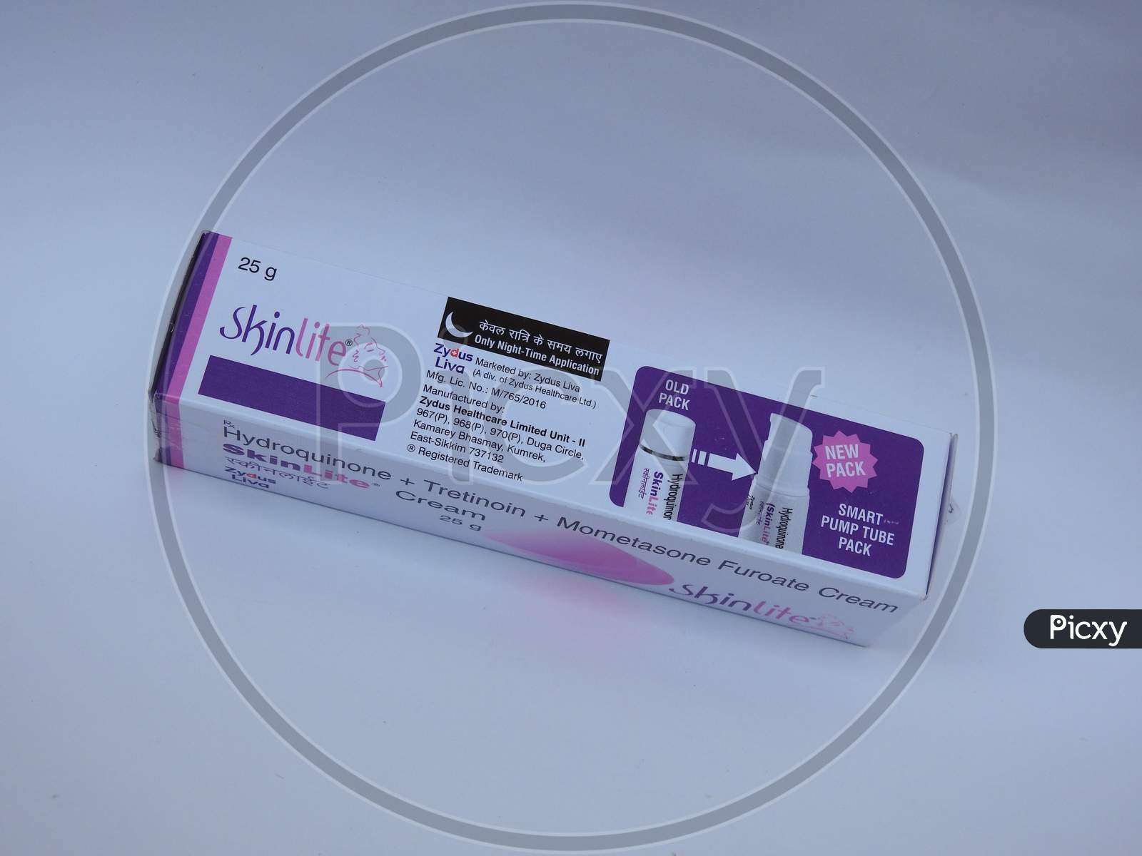 Closeup of SkinLite Cream 25g Pack and Tube isolated on White Background