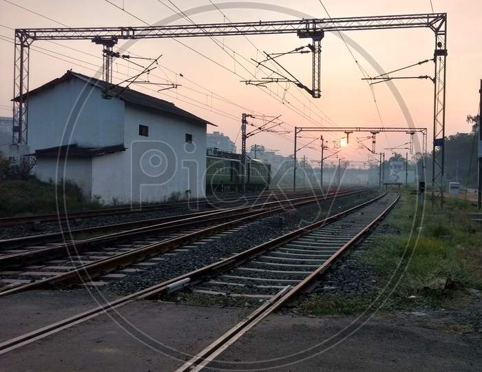 Railway crossing under the morning sun
