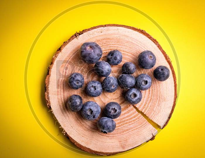 Delicious Blueberries On Wooden Table