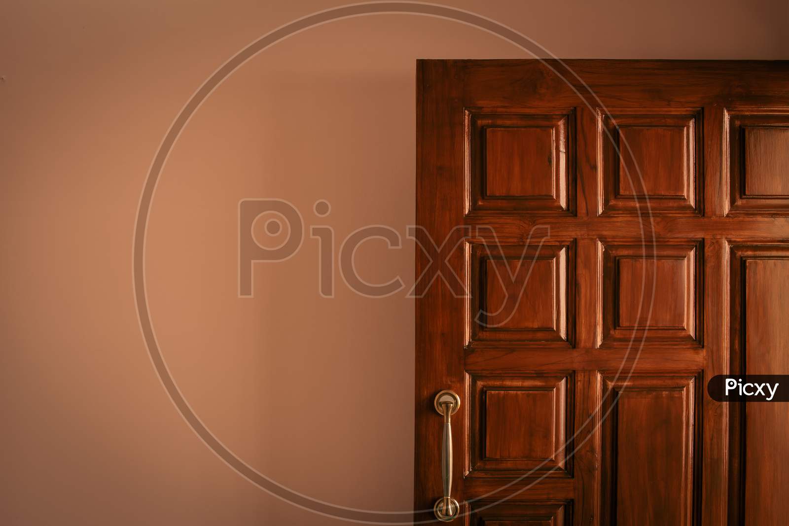 Polished And Designer Wooden Main Door Of An Apartment In A Building