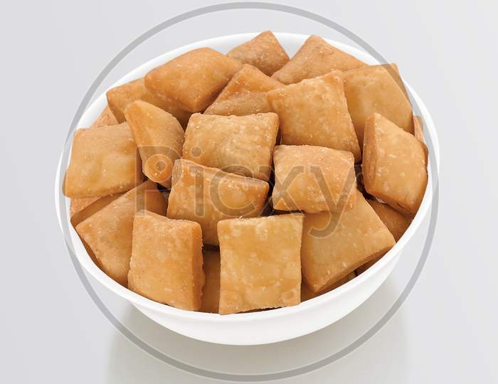 Shakkar Pare Also Know As Shakkarpare, Shakarpare, Shakarpali, Shakkar Para, Sakarpara Or Shankarpalli Or Shankar Pale Is A Snack Typically Made In India During Diwali - Image
