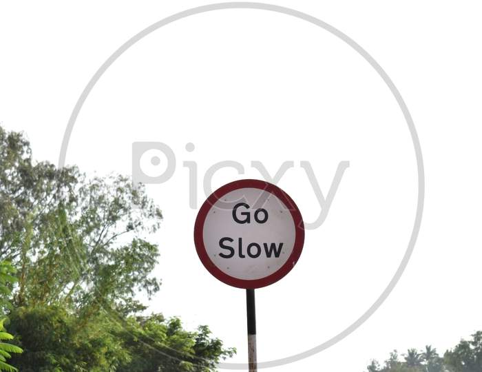 Go slow sign board