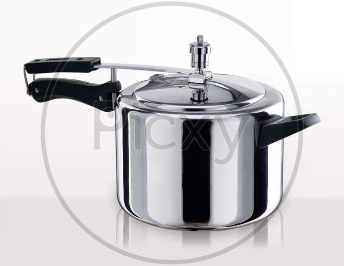 High Pressure Aluminum Cooking Pot With Safety Cover, Multicooker And Pressure Cooker An Image Isolated