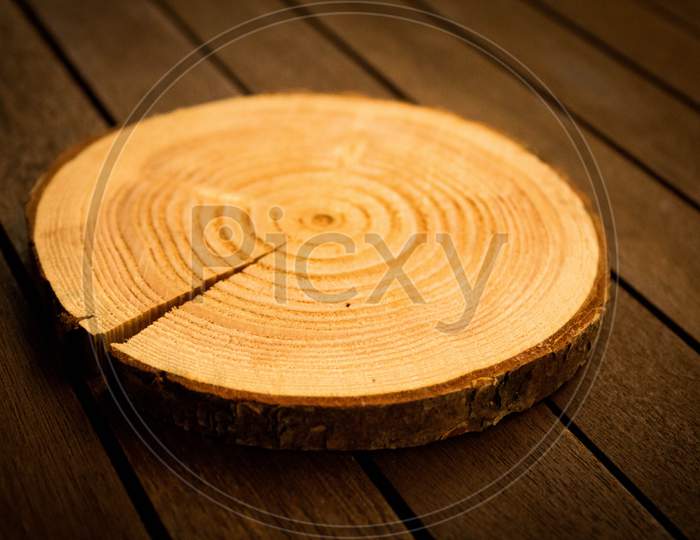 Wood Slice On Wooden Table