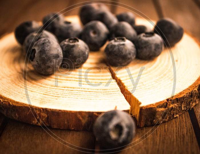 Delicious Blueberries On Wooden Table