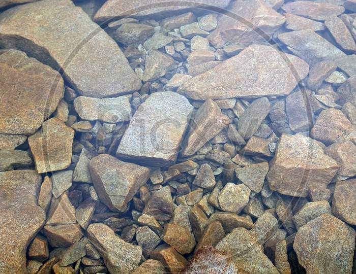 Stones Under The Clear Water Of Lake