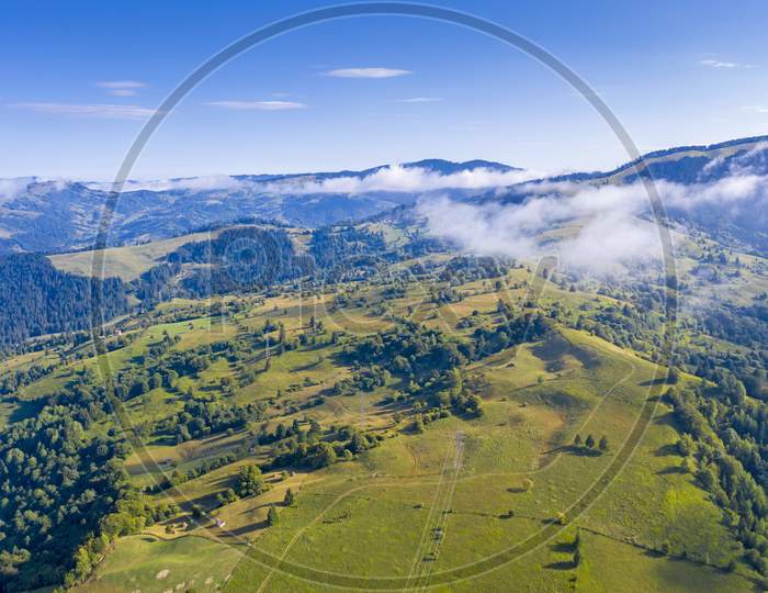 Aerial View Of Summer Pasture And Fog