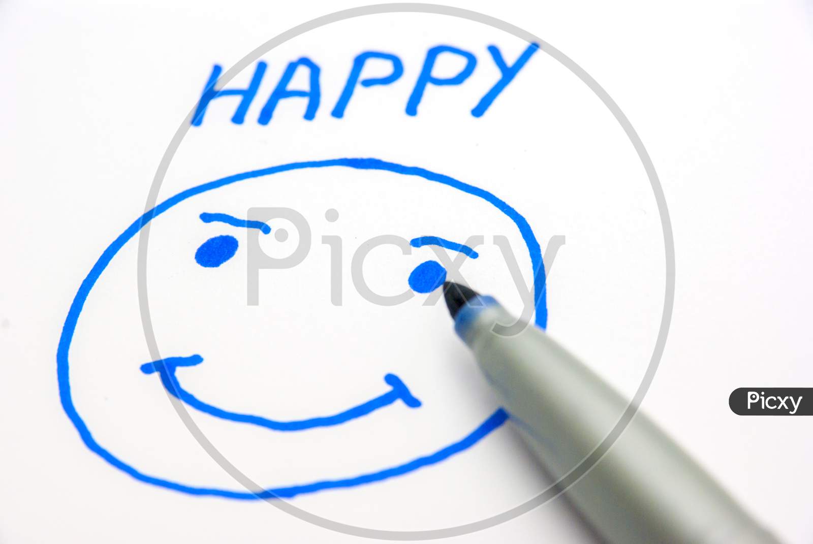 Drawing A Happy Face On Paper