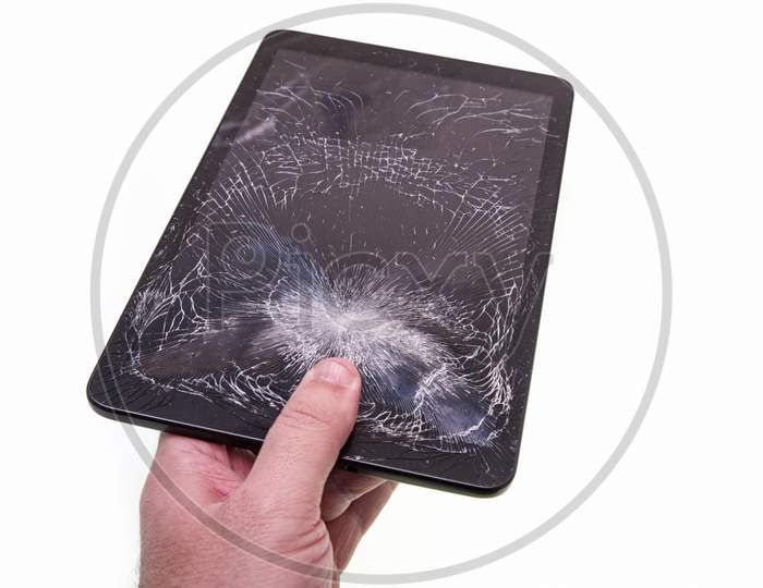 Hand With Cracked Tablet