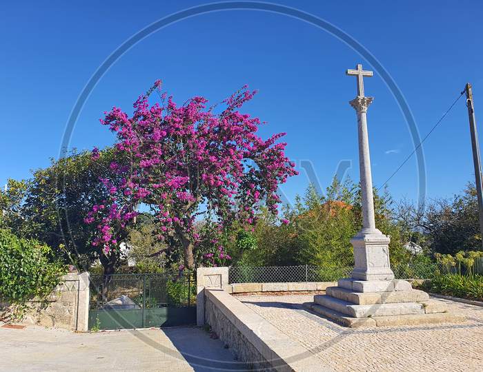 Cross Monument In A Portuguese Village