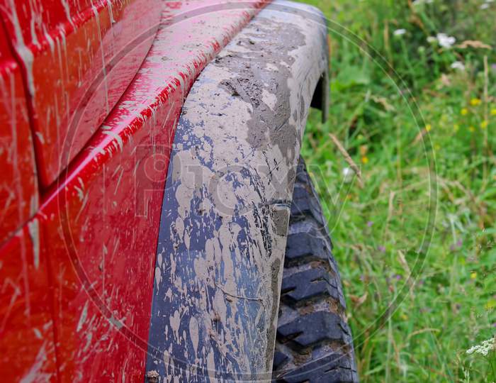 Dirty mudguard of car
