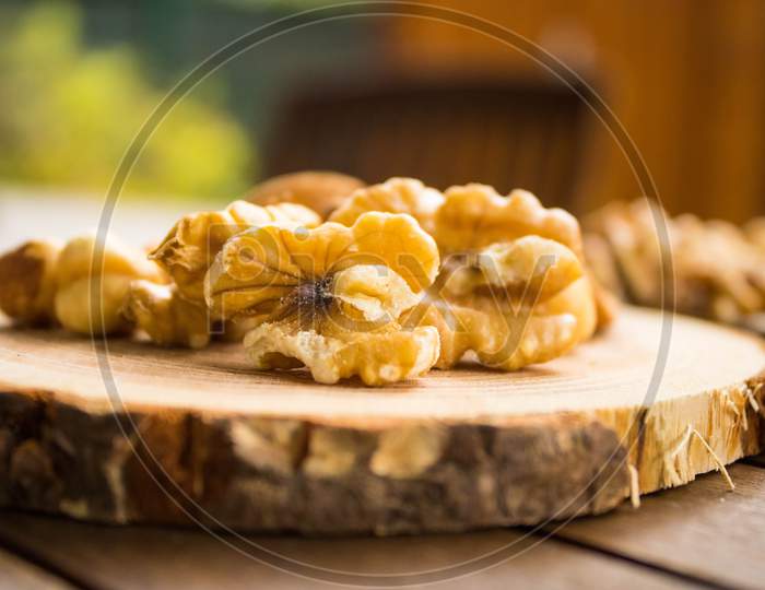 Walnuts On A Wooden Table