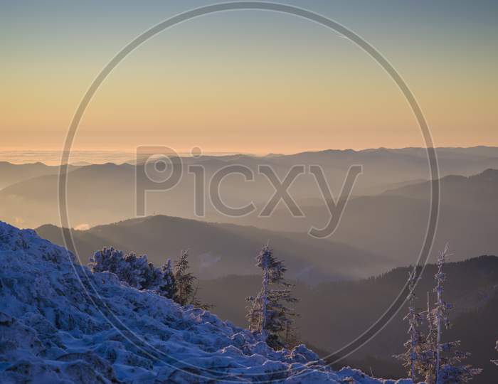 Mountain Sunrise Scene In Winter