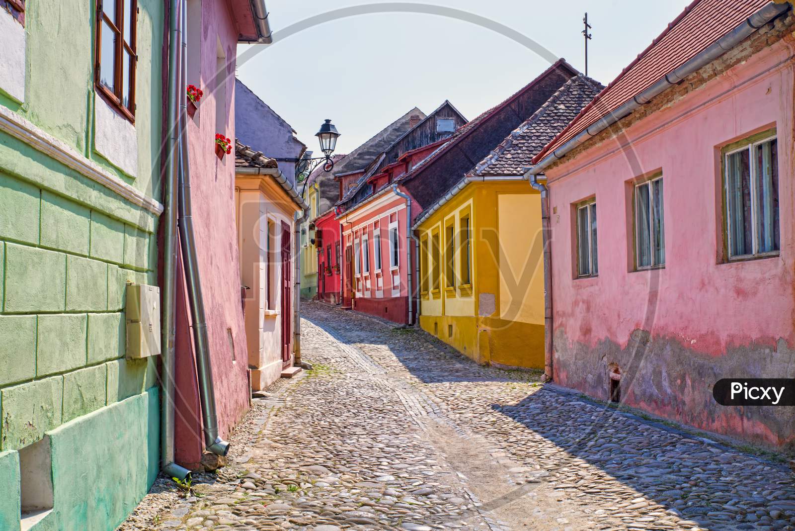 Stone Paved Road And Colorful Houses