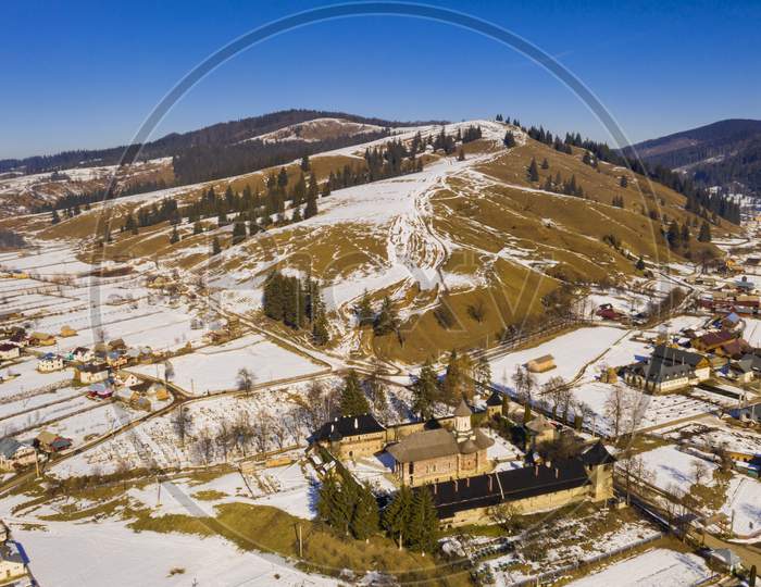 Moldovita Monastery, Above View In A Sunny Winter Day