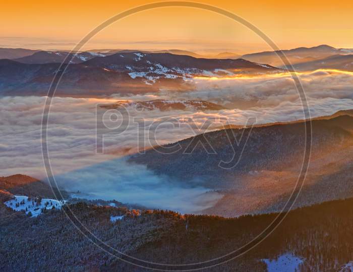 Winter Sunrise Panorama In Mountains