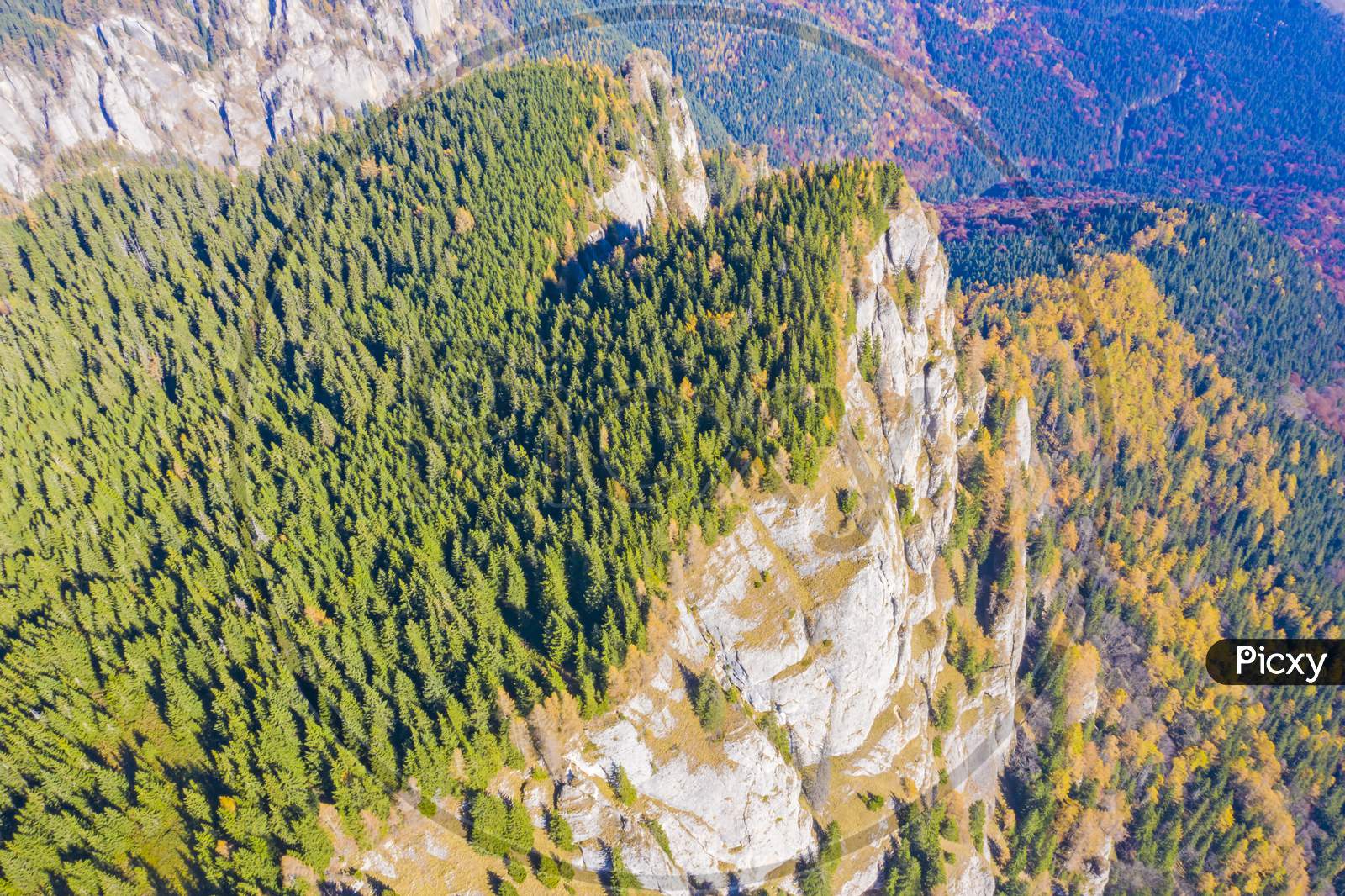 Rock Mountain And Autumn Forest Viewed From Above