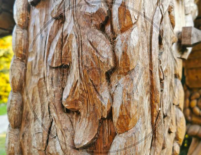 Close Image Of Wooden Pillar Sculpture