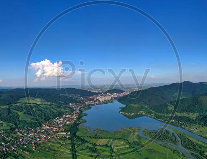 Aerial Summer Landscape Of Green Valley And Piatra Neamt City