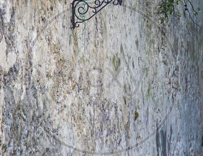 Street Lamp On Aged Wall