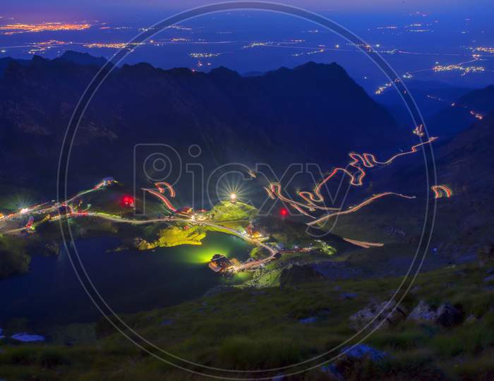 Night Over Mountain Road And Valley Scene