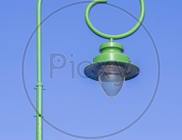 Street Lamp Pillar Against Blue Sky