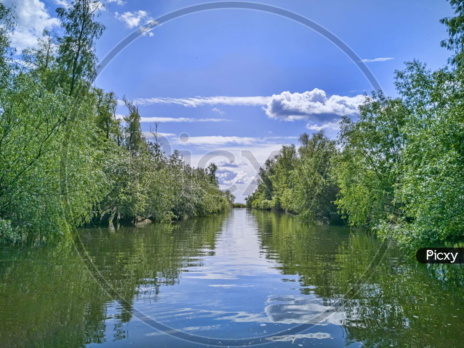 Boat Trip On Water Canal In Danube Delta