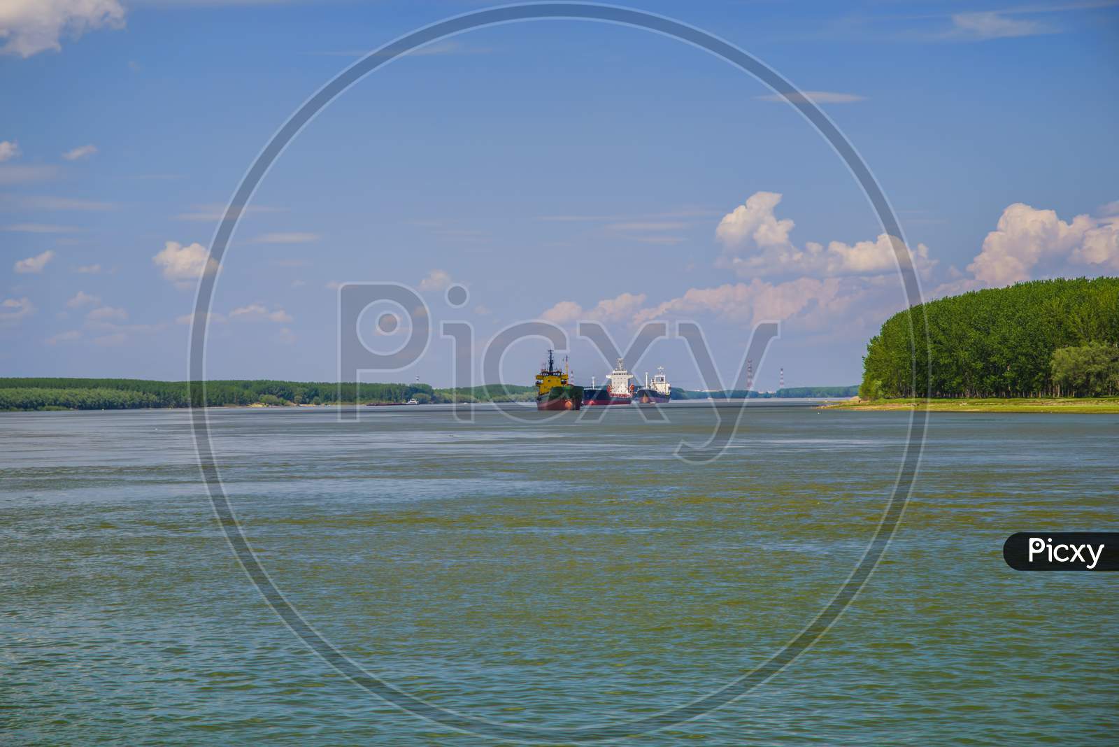 Cargo Ships Downstream On Danube River
