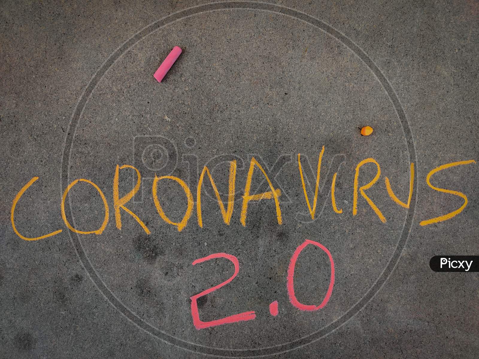 The Inscription Text On The Grey Board, Corona Virus 2.0 Using Color Chalk Pieces.
