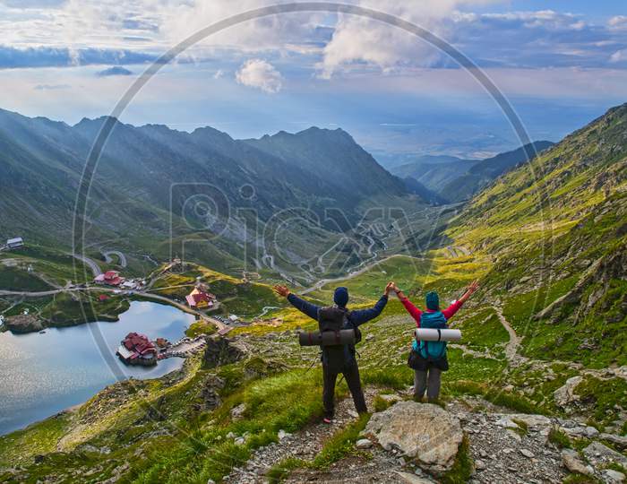 Happy Tourists In Romanian Mountains