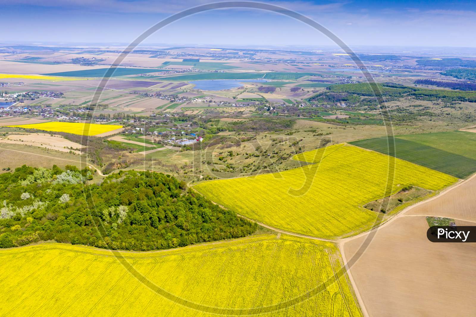 Aerial View Of Yellow And Green Fields