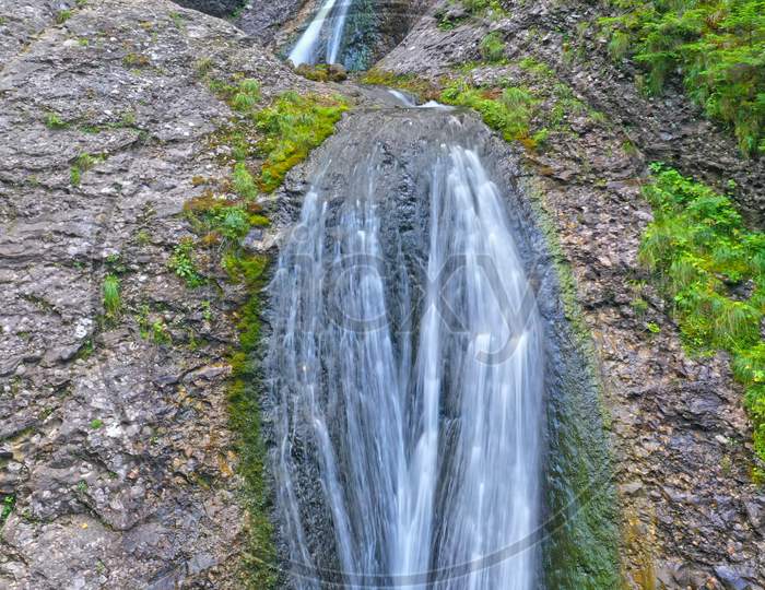 Summer Waterfall In Romanian Mountains