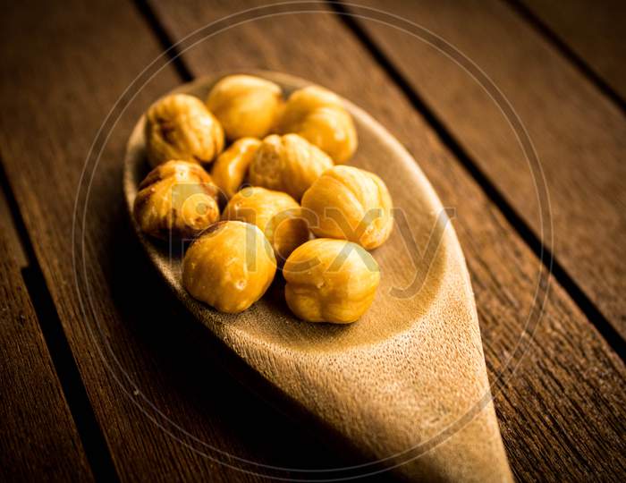 Hazelnuts On A Wooden Table